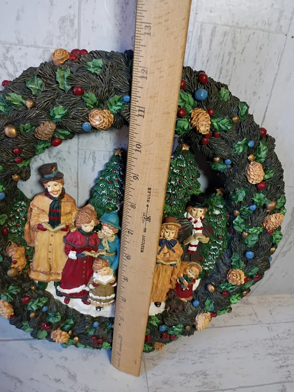 Resin wreath with vintage Christmas carols: traditional Christmas decoration